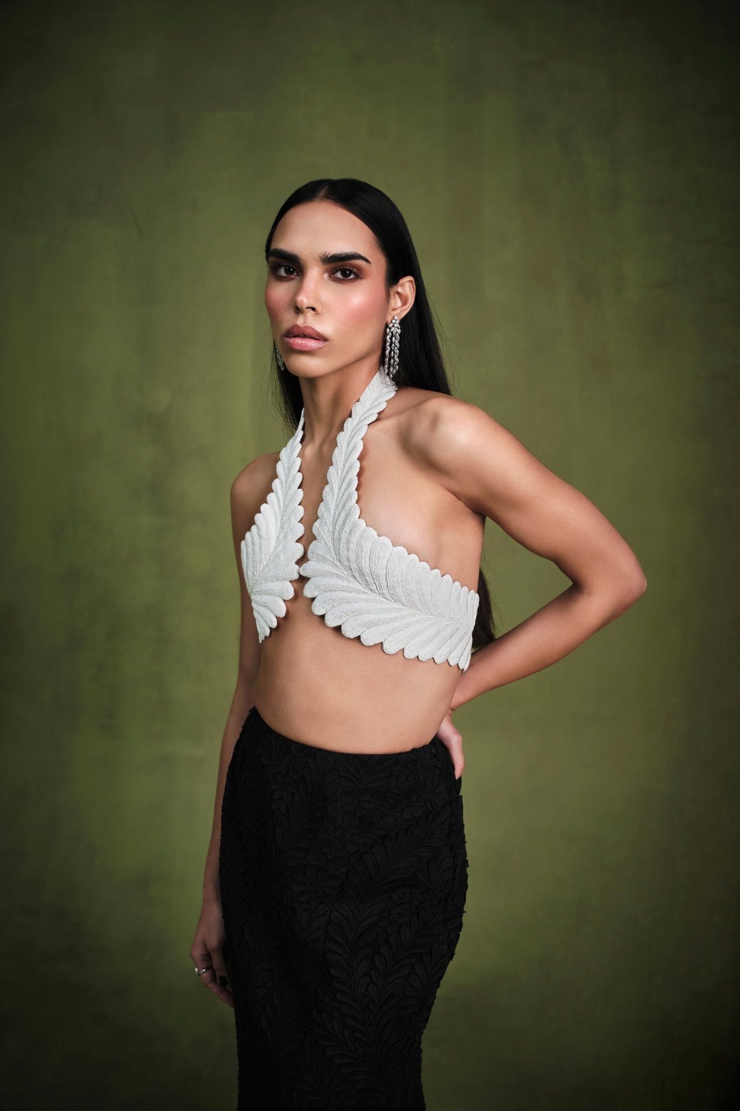 THE IVORY-NOIRE ENGRAVED HALTER-HARNESS AND APPLIQUE SKIRT