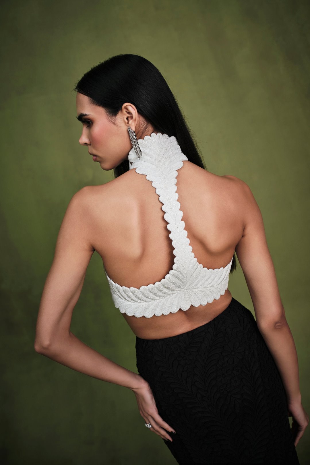 THE IVORY-NOIRE ENGRAVED HALTER-HARNESS AND APPLIQUE SKIRT